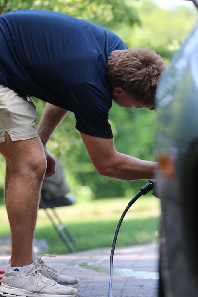Brady of BK Mobile Detailing working a mobile detail at a customer's home
